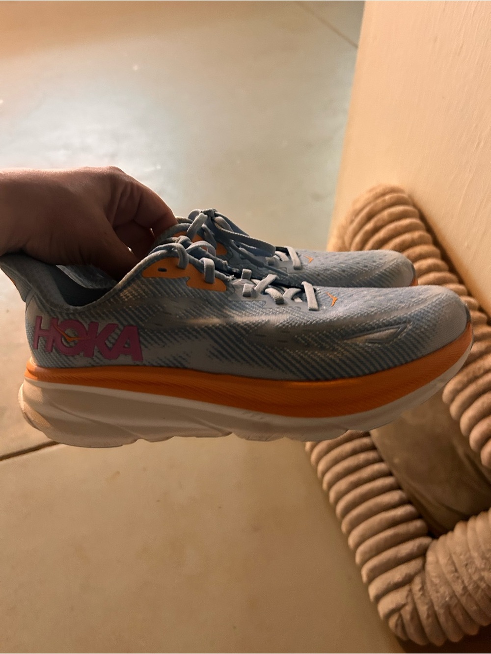 Hoka women Running Sneaker in Light Blue with Orange Accents 9.5D wide